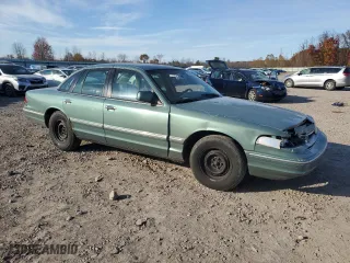 1997 Ford Crown Victoria with VIN 2FALP73W6VX173232, listed as a Copart auction lot 77805094 with 228,871 mi miles and Salvage Title. Bid and sale history available at carsss.com. Image 4.