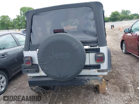 2004 Jeep Wrangler Sport with VIN 1J4FA49S44P772575, listed as a IAAI auction lot 42512876 with 226,387 mi miles and . Bid and sale history available at DreamBid. Image 17.