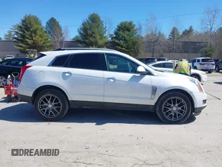 2013 Cadillac SRX Performance Collection with VIN 3GYFNDE33DS637155, listed as a IAAI auction lot 41977706 with 140,668 mi miles and . Bid and sale history available at DreamBid. Image 13.