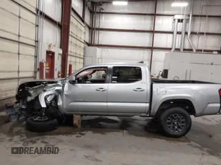 2023 Toyota Tacoma SR with VIN 3TMCZ5AN9PM604793, listed as a IAAI auction lot 42251347 with 39,741 mi miles and . Bid and sale history available at DreamBid. Image 15.