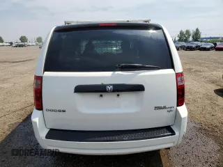 2009 Dodge Grand Caravan with VIN 1D8HN11E99B505784, listed as a Copart auction lot 60590065 with 195,488 mi miles and Salvage title. Bid and sale history available at DreamBid. Image 6.