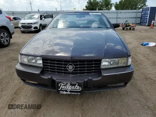1992 Cadillac Seville z VIN 1G6KY53BXNU804126, wystawiony jako Copart lot #69219394 z przebiegiem 100 647 mil mil oraz Czysty tytuł • Clean title. Historia ofert i sprzedaży dostępna na DreamBid. Obrazek 5.