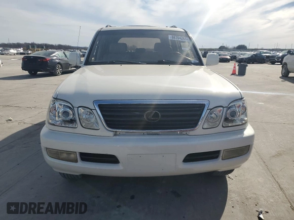 2002 Lexus LX 470 z VIN JTJHT00W623514108, wystawiony jako Copart lot #88704265 z przebiegiem Nie podano mil oraz Tytuł czysty. Historia ofert i sprzedaży dostępna na DreamBid. Obrazek 5.