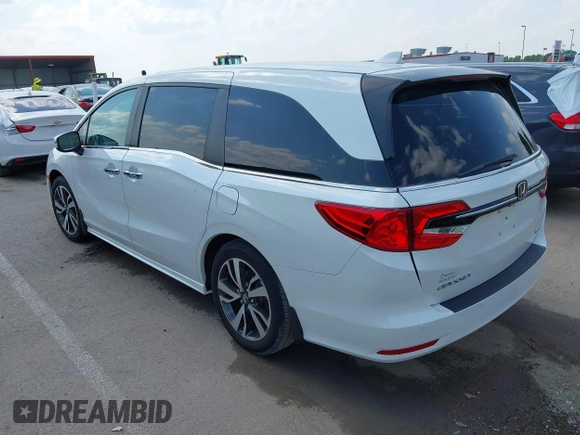 2023 Honda Odyssey Touring with VIN 5FNRL6H8XPB038875, listed as a IAAI auction lot 42441076 with 13,947 mi miles and . Bid and sale history available at DreamBid. Image 3.