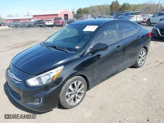 2017 Hyundai Accent SE with VIN KMHCT4AE1HU386384, listed as a IAAI auction lot 41656299 with 121,336 mi miles. Bid and sale history available at carsss.com. Image 2.