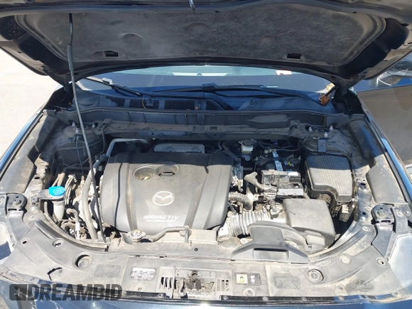 2018 Mazda CX-5 Touring z VIN JM3KFACM5J0309533, wystawiony jako IAAI lot #42195429 z przebiegiem 91 928 mil mil oraz . Historia ofert i sprzedaży dostępna na DreamBid. Obrazek 10.