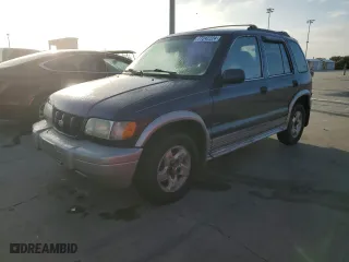 1998 Kia Sportage with VIN KNDJA7238W5579428, listed as a Copart auction lot 77242224 with 160,700 mi miles and Salvage Title. Bid and sale history available at carsss.com. Image 1.