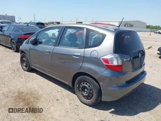 2013 Honda Fit with VIN JHMGE8H37DC048529, listed as a IAAI auction lot 42011202 with 255,113 mi miles. Bid and sale history available at carsss.com. Image 3.