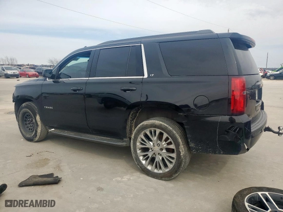 2019 Chevrolet Tahoe LT with VIN 1GNSCBKCXKR185912, listed as a Copart auction lot 46854595 with 284,794 mi miles and Salvage Title. Bid and sale history available at carsss.com. Image 2.