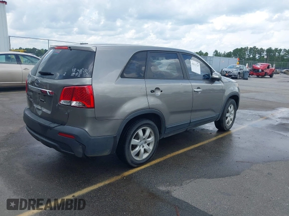 2013 Kia Sorento LX with VIN 5XYKT3A1XDG381218, listed as a IAAI auction lot 42511747 with 130,253 mi miles and . Bid and sale history available at DreamBid. Image 4.