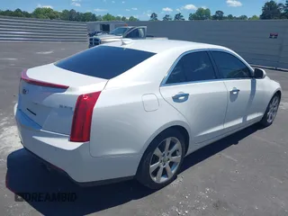 2016 Cadillac ATS Luxury Collection RWD z VIN 1G6AB5RX4G0133529, wystawiony jako IAAI lot #42314146 z przebiegiem 158 897 mil mil oraz . Historia ofert i sprzedaży dostępna na DreamBid. Obrazek 4.