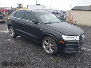 2018 Audi Q3 Premium Plus with VIN WA1JCCFS5JR014957, listed as a IAAI auction lot 41099133 with 73,905 mi miles. Bid and sale history available at carsss.com. Image 1.