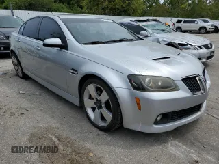 2009 Pontiac G8 GT with VIN 6G2EC57Y89L226490, listed as a Copart auction lot 68644564 with 158,904 mi miles and Salvage Title. Bid and sale history available at DreamBid. Image 4.