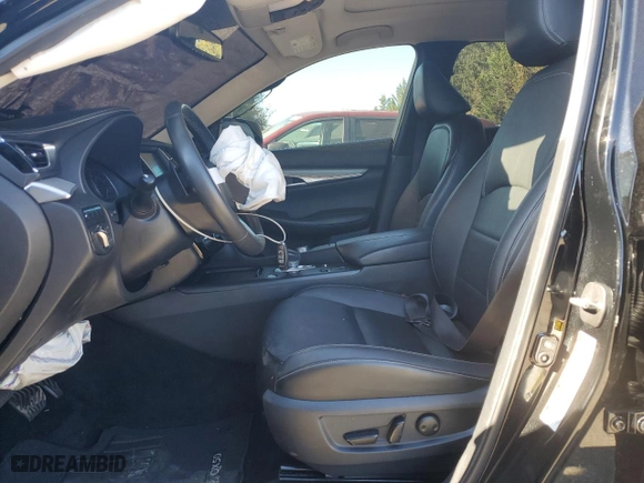 2019 Infiniti QX50 LUXE with VIN 3PCAJ5M35KF142982, listed as a Copart auction lot 77322464 with 73,997 mi miles and Salvage Title. Bid and sale history available at carsss.com. Image 7.