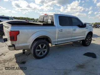 2019 Ford F-150 XL with VIN 1FTEW1E45KFB43127, listed as a Copart auction lot 50134345 with 194,396 mi miles and Salvage Title. Bid and sale history available at DreamBid. Image 3.