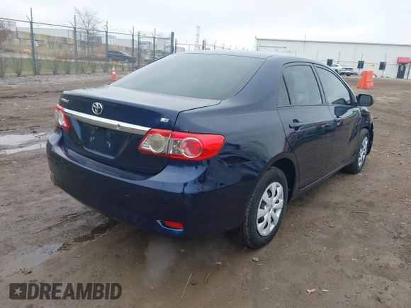 2012 Toyota Corolla L with VIN 5YFBU4EE4CP031190, listed as a IAAI auction lot 42015131 with 210,689 mi miles. Bid and sale history available at carsss.com. Image 4.
