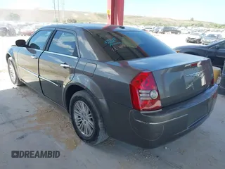 2010 Chrysler 300 Touring with VIN 2C3CA5CV5AH233033, listed as a IAAI auction lot 42130676 with 158,323 mi miles and . Bid and sale history available at DreamBid. Image 3.
