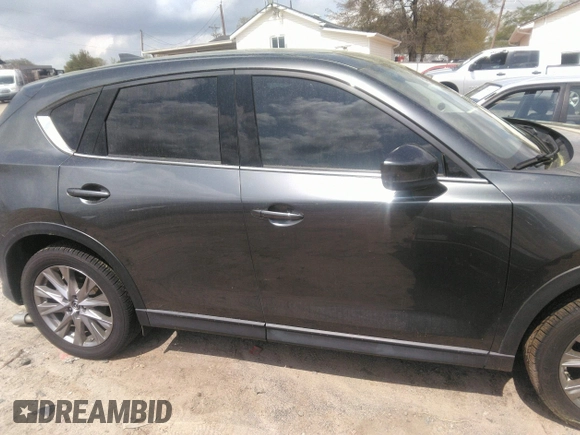 2019 Mazda CX-5 Grand Touring with VIN JM3KFBDM7K0606860, listed as a IAAI auction lot 41936338 with 93,057 mi miles. Bid and sale history available at carsss.com. Image 13.