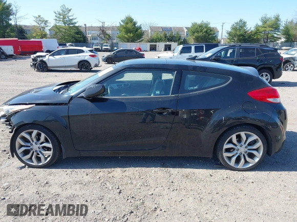 2013 Hyundai Veloster w/Gray Int with VIN KMHTC6AD4DU131242, listed as a IAAI auction lot 42074517 with 76,713 mi miles and . Bid and sale history available at DreamBid. Image 14.