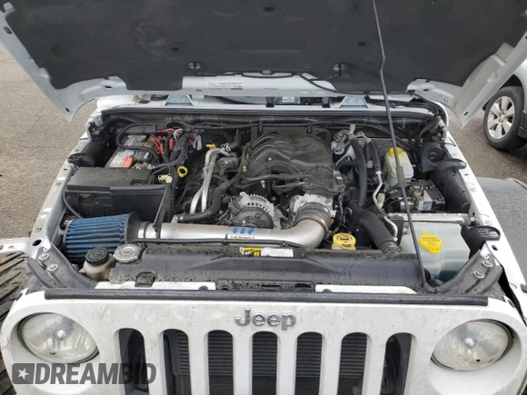 2015 Jeep Wrangler Unlimited Rubicon with VIN 1C4BJWFGXFL693566, listed as a Copart auction lot 46628765 with 70,128 mi miles and Salvage Title. Bid and sale history available at carsss.com. Image 11.