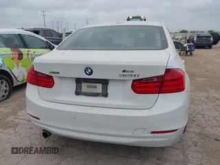 2014 BMW 3 Series 320i xDrive with VIN WBA3C3C52EP661389, listed as a IAAI auction lot 42160042 with 131,997 mi miles and . Bid and sale history available at DreamBid. Image 17.