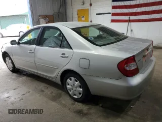 2003 Toyota Camry LE with VIN 4T1BE32K33U710903, listed as a Copart auction lot 56976585 with 157,444 mi miles and Clean Title. Bid and sale history available at DreamBid. Image 2.