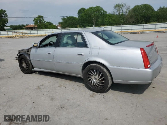 2010 Cadillac DTS 1SA z VIN 1G6KA5EY5AU111898, wystawiony jako Copart lot #54946955 z przebiegiem 44 259 mil mil oraz Szkoda całkowita • Salvage title. Historia ofert i sprzedaży dostępna na DreamBid. Obrazek 2.