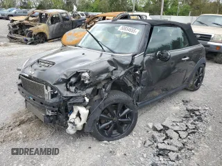 2012 MINI Convertible S with VIN WMWZP3C58CT296381, listed as a Copart auction lot 50834655 with 111,228 mi miles and Salvage Title. Bid and sale history available at DreamBid. Image 1.