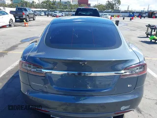 2014 Tesla Model S 60 with VIN 5YJSA1S15EFP29010, listed as a IAAI auction lot 41798180 with 142,754 mi miles and . Bid and sale history available at DreamBid. Image 16.