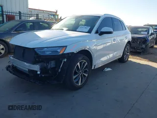 2022 Audi Q5 S line Premium Plus with VIN WA1EAAFY7N2116498, listed as a IAAI auction lot 42077807 with 24,996 mi miles and . Bid and sale history available at DreamBid. Image 2.
