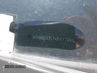 2004 Volkswagen Touareg z VIN WVGBC67L74D017200, wystawiony jako IAAI lot #42305070 z przebiegiem Nie podano mil oraz . Historia ofert i sprzedaży dostępna na DreamBid. Obrazek 12.