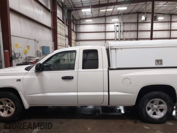 2009 Dodge Dakota Bighorn/Lonestar with VIN 1D3HW32P79S819674, listed as a IAAI auction lot 41962369 with 157,399 mi miles and . Bid and sale history available at carsss.com. Image 15.