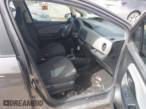 2015 Toyota Yaris L with VIN VNKKTUD32FA037394, listed as a IAAI auction lot 41753236 with Not Provided miles and . Bid and sale history available at DreamBid. Image 5.