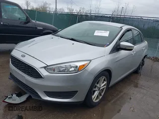 2016 Ford Focus SE with VIN 1FADP3F28GL386303, listed as a IAAI auction lot 41905397 with 158,112 mi miles. Bid and sale history available at carsss.com. Image 2.