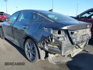 2019 Kia Optima LX with VIN 5XXGT4L36KG292905, listed as a IAAI auction lot 42011723 with 113,553 mi miles. Bid and sale history available at carsss.com. Image 3.