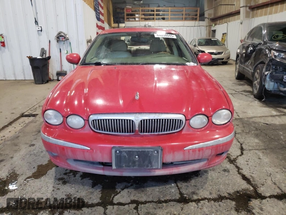 2004 Jaguar X-Type with VIN SAJEA51CX4WE15195, listed as a Copart auction lot 57868405 with 171,698 mi miles and Non Repairable. Bid and sale history available at DreamBid. Image 5.