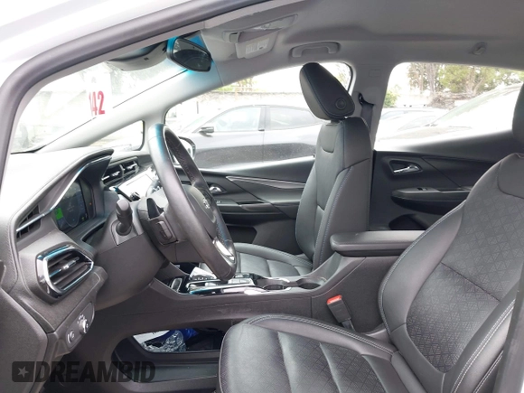 2023 Chevrolet Bolt EV 2LT z VIN 1G1FX6S07P4198027, wystawiony jako IAAI lot #42453916 z przebiegiem 5 133 mil mil oraz . Historia ofert i sprzedaży dostępna na DreamBid. Obrazek 21.