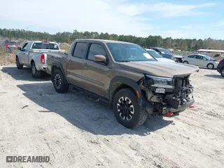 2023 Nissan Frontier PRO-4X with VIN 1N6ED1EKXPN620732, listed as a IAAI auction lot 41839561 with 27,496 mi miles. Bid and sale history available at carsss.com. Image 1.