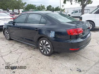 2013 Volkswagen Jetta Hybrid SE with VIN 3VW637AJ0DM281198, listed as a IAAI auction lot 42710130 with 68,068 mi miles and . Bid and sale history available at DreamBid. Image 3.