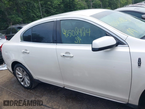 2013 Lincoln MKS with VIN 1LNHL9DK6DG600928, listed as a IAAI auction lot 42502424 with 194,015 mi miles and . Bid and sale history available at DreamBid. Image 13.