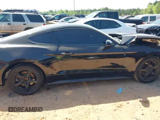 2017 Ford Mustang V6 z VIN 1FA6P8AM5H5256208, wystawiony jako IAAI lot #42069664 z przebiegiem 82 427 mil mil oraz . Historia ofert i sprzedaży dostępna na DreamBid. Obrazek 13.