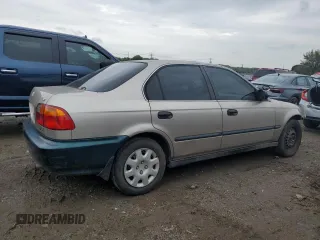 2000 Honda Civic LX with VIN 1HGEJ6675YL019892, listed as a Copart auction lot 73347734 with 400,995 mi miles and Salvage Title. Bid and sale history available at carsss.com. Image 3.