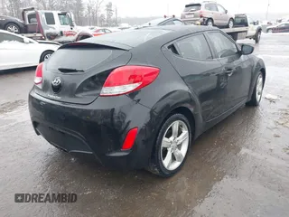 2012 Hyundai Veloster w/Black Int with VIN KMHTC6ADXCU024923, listed as a IAAI auction lot 41556793 with 101,923 mi miles and . Bid and sale history available at DreamBid. Image 4.