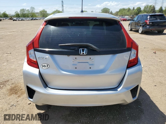 2015 Honda Fit LX с VIN 3HGGK5H5XFM723903, выставлен на аукционе Copart как лот 57249685 с пробегом 90 949 миль миль и Списание • Salvage title. История ставок и продаж доступна на DreamBid. Изображение 6.