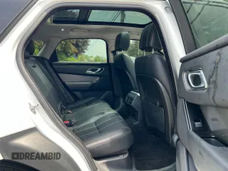 2018 Land Rover Range Rover Velar S z VIN SALYB2RX8JA751277, wystawiony jako Copart lot #58985735 z przebiegiem 122 330 mil mil oraz Czysty tytuł • Clean title. Historia ofert i sprzedaży dostępna na DreamBid. Obrazek 6.