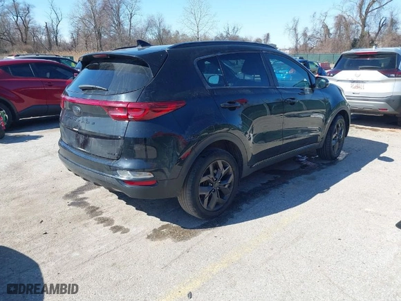2021 Kia Sportage S with VIN KNDP6CACXM7867510, listed as a IAAI auction lot 41740288 with 64,198 mi miles. Bid and sale history available at carsss.com. Image 4.