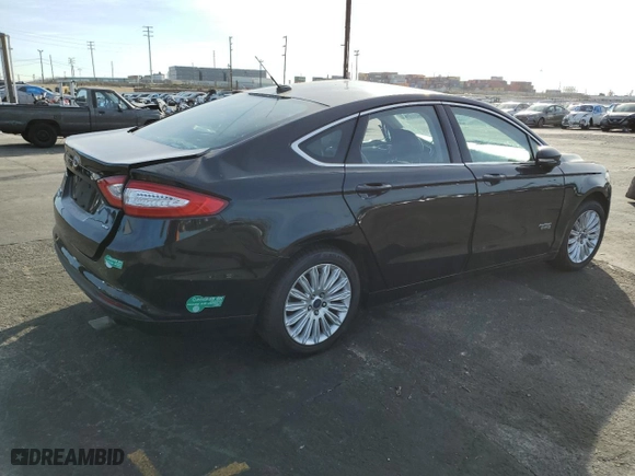 2016 Ford Fusion Energi SE Luxury with VIN 3FA6P0PUXGR123058, listed as a Copart auction lot 49013935 with 184,535 mi miles and Salvage Title. Bid and sale history available at carsss.com. Image 3.