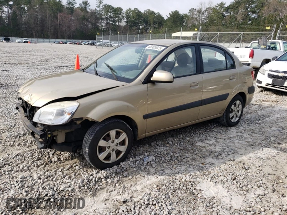 2009 Kia Rio LX with VIN KNADE223296470687, listed as a Copart auction lot 48385925 with 176,400 mi miles and Salvage Title. Bid and sale history available at DreamBid. Image 1.
