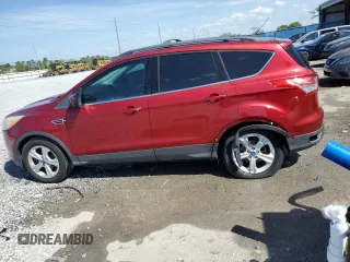 2013 Ford Escape SE with VIN 1FMCU0GX3DUC83749, listed as a Copart auction lot 51007375 with 97,027 mi miles and Salvage Title. Bid and sale history available at DreamBid. Image 2.