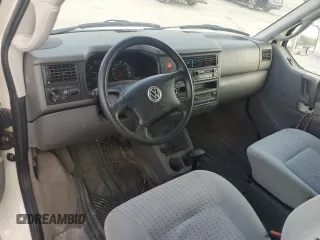 2002 Volkswagen EuroVan с VIN WV2KB47072H018503, выставлен на аукционе Copart как лот 75546724 с пробегом 179 688 миль миль и Списание • Salvage title. История ставок и продаж доступна на DreamBid. Изображение 8.